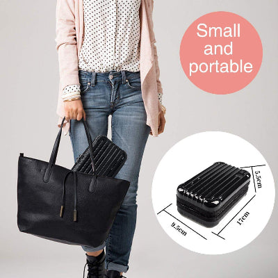 Person holding a black handbag with a small portable item, labeled 'Small and portable'.